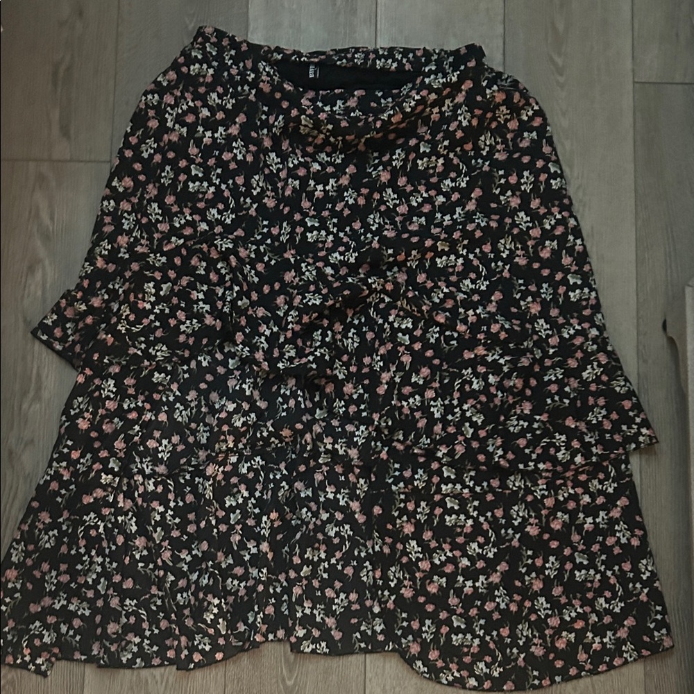 Floral Black Skirt with front slit and built-in shorts.